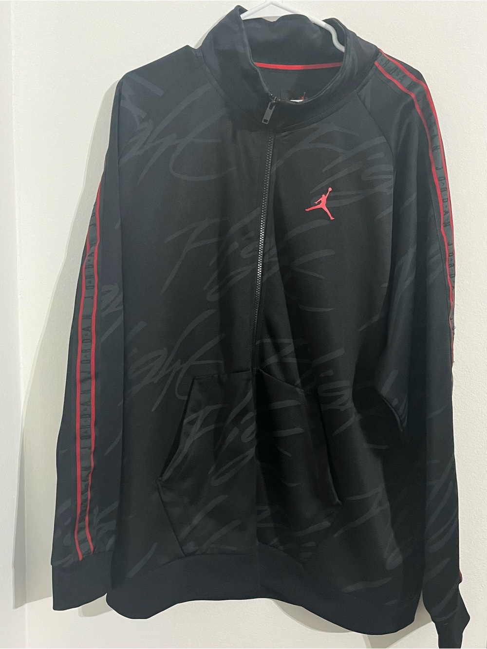 Jordan Men's Black Zip-Up Track Jacket with Red Accents